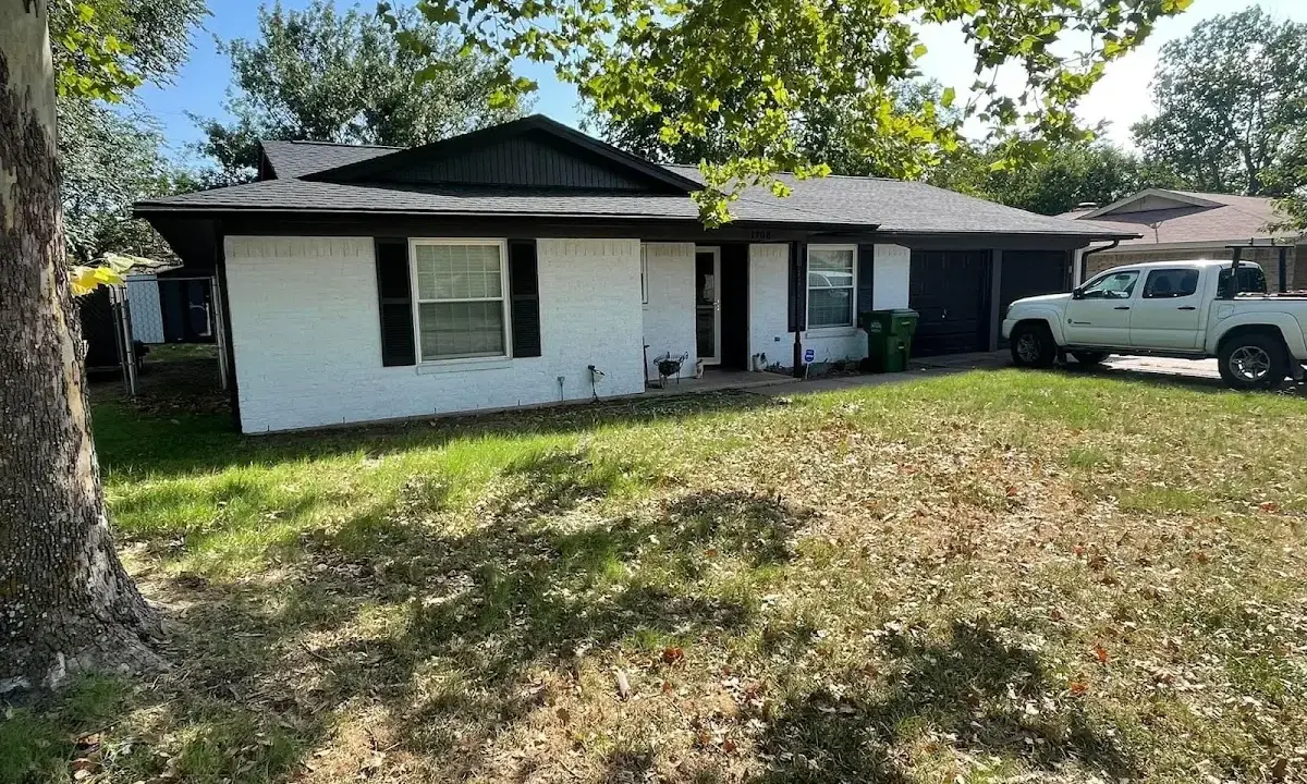 Professional roofing crew working on a residential roof in Foster City
